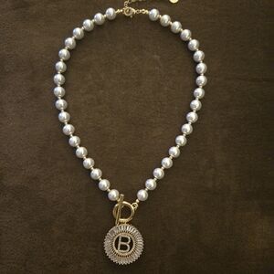 Elegant Pearl Necklace with Gold Accents
